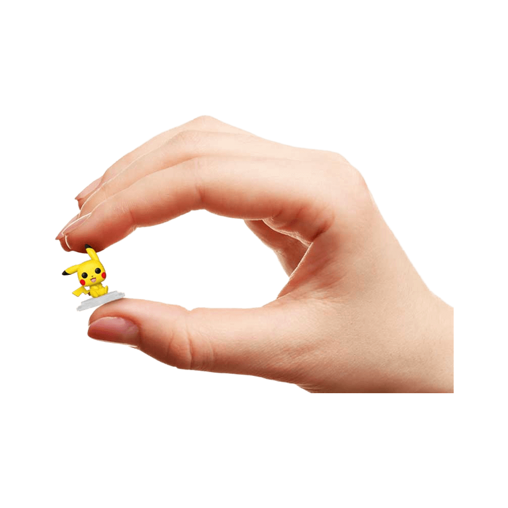 Hand holding Funko Bitty Pop: Pokemon - Pikachu 4pk miniature figure